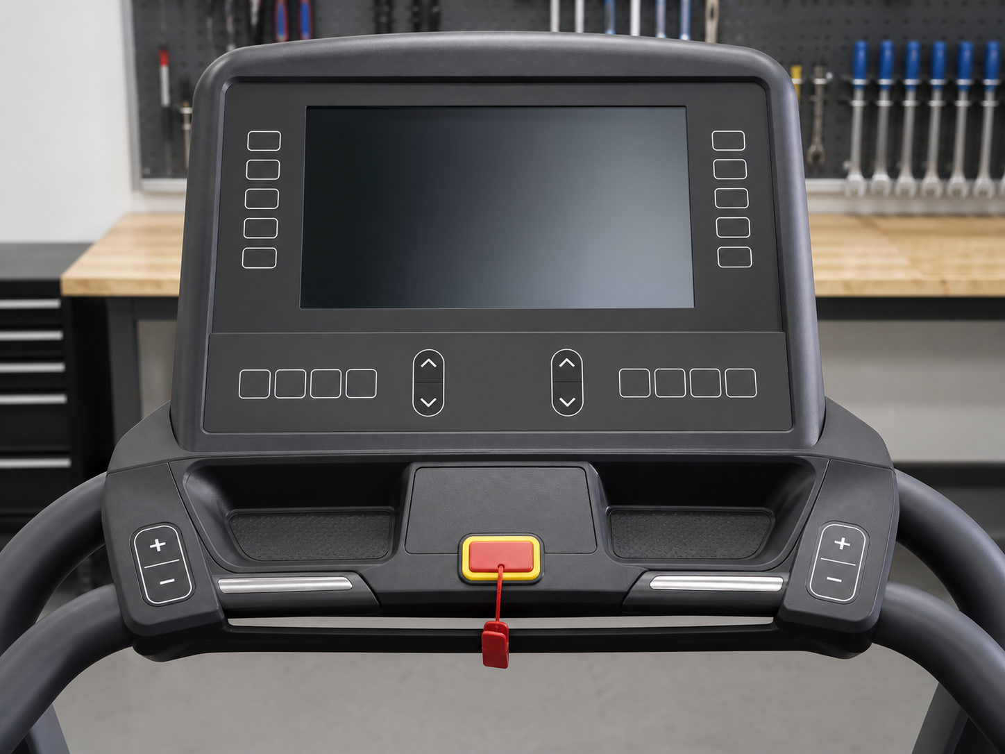 Treadmill console with display, controls, and safety key